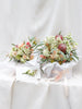 An example of a blush, native inspired wedding bouquet package. The package pictured includes a Bridal bouquet, Bridesmaids Bouquet and a buttonhole. 